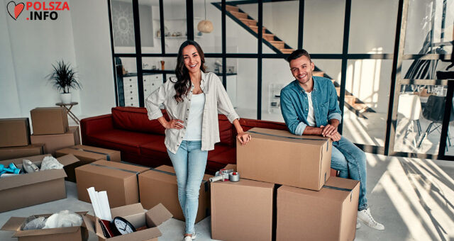 640 a-young-married-couple-unpacking-things-from-boxes-in-the-living-room-moving-buying-a-house